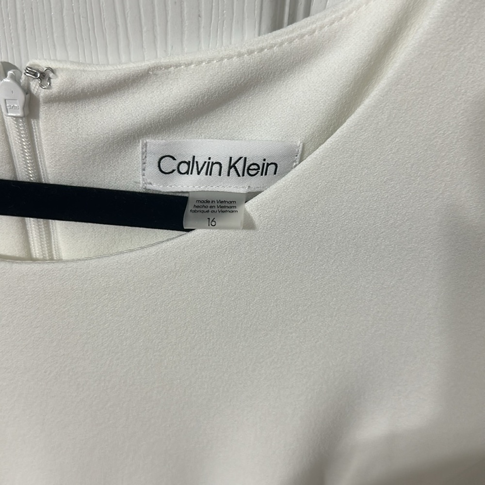 Calvin Klein white ruffle sleeve and bottom dress. Knee length. - Picture 2 of 3